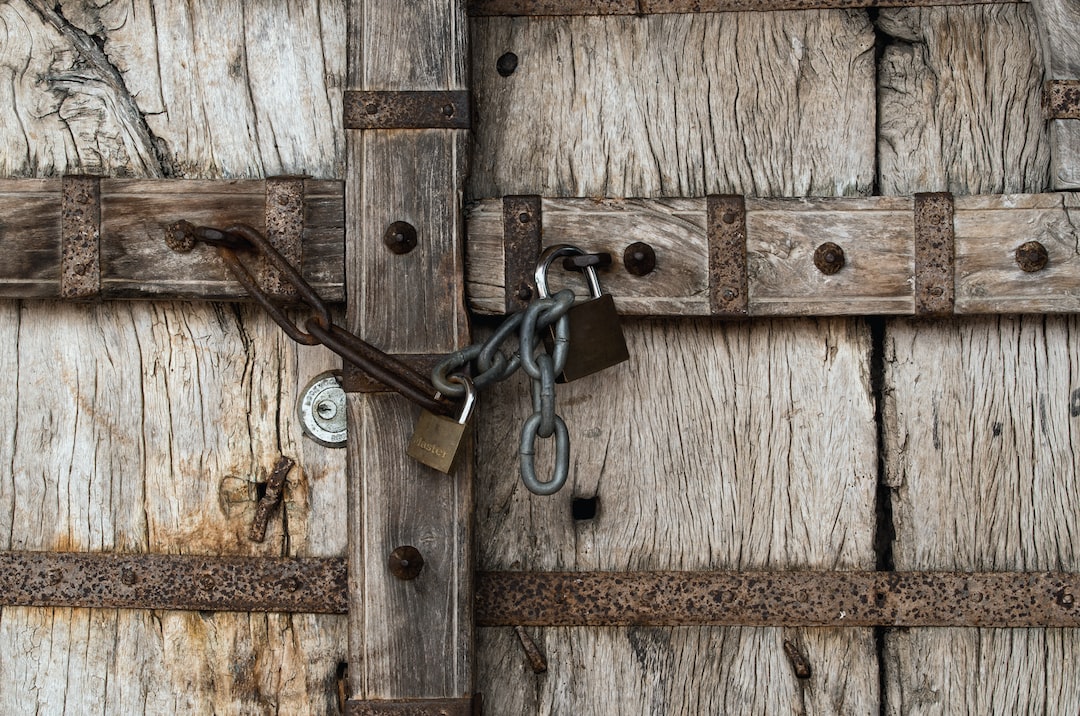A wooden door with a padlock depicting unwavering faith.
