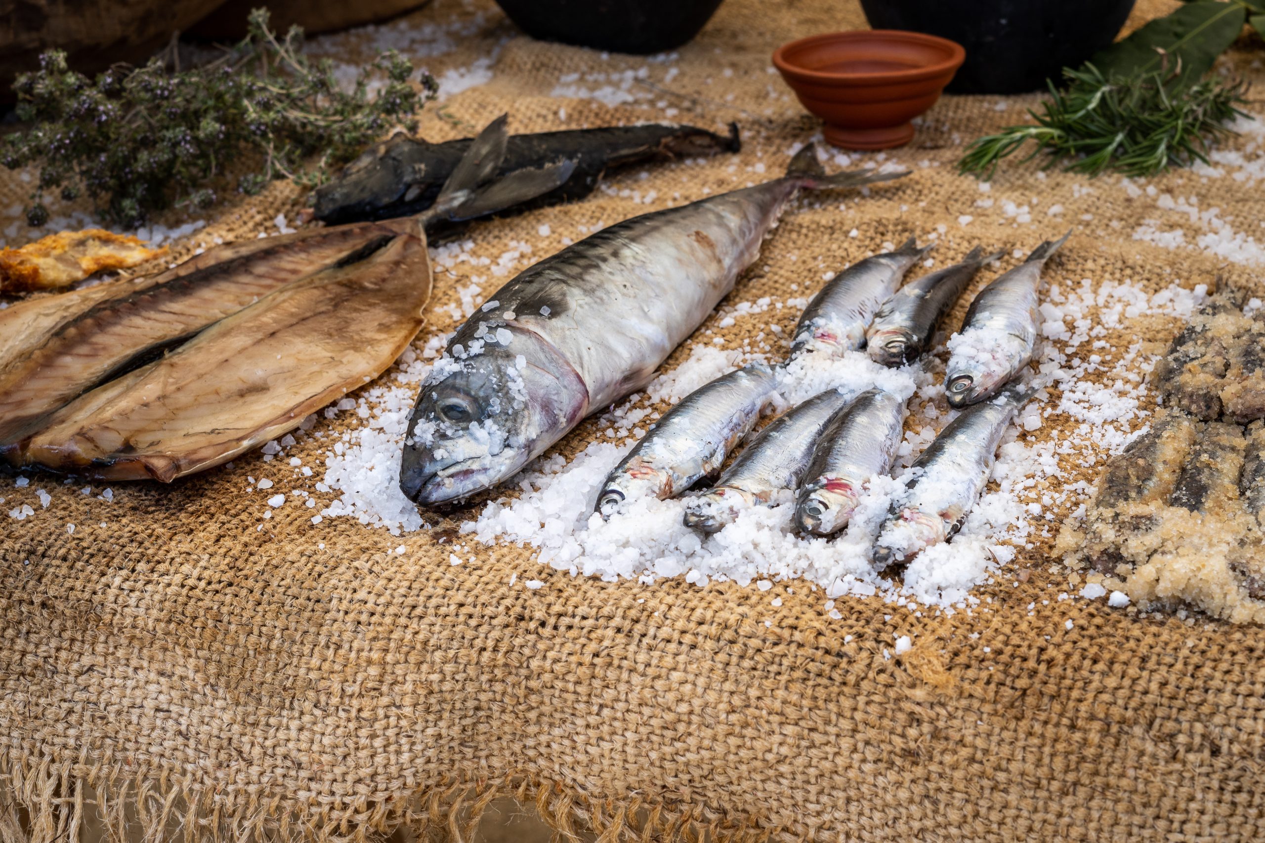 A sack of fish symbolizes divine seasoning.